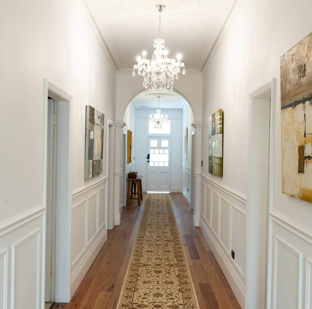Hallway with wainscoting after repainting
